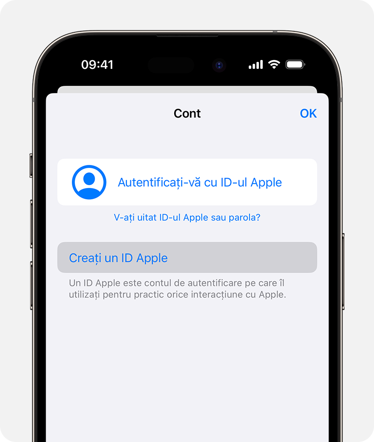 Ecranul iPhone care arată opțiunea de a te autentifica cu Apple ID 