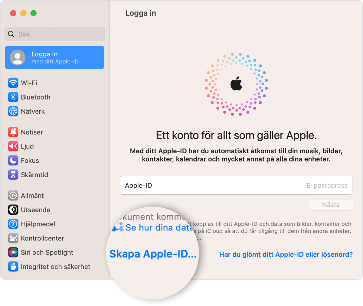 Mac-skärm som visar länken Skapa Apple‑ID att klicka