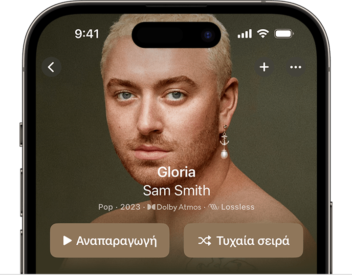 iPhone στο οποίο εμφανίζεται το κουμπί «Τυχαία σειρά» στο επάνω μέρος ενός άλμπουμ στην εφαρμογή Apple Music