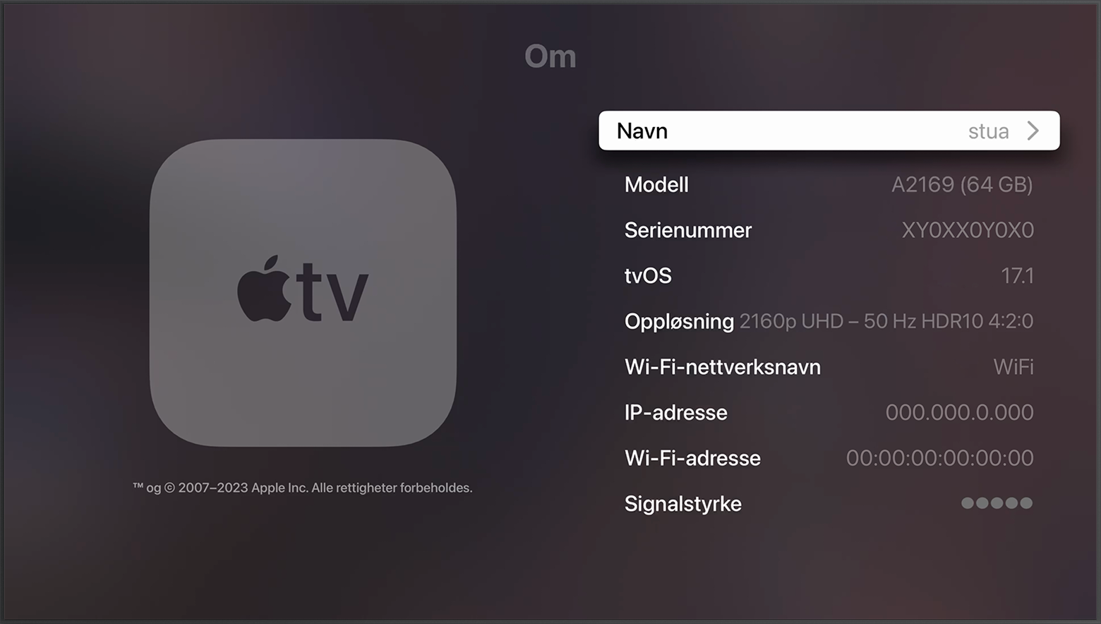 Serienummeret vises nær toppen av Om-skjermen på Apple TV