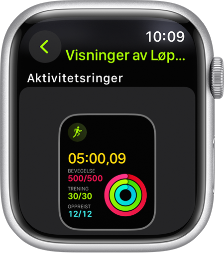 En Apple Watch som viser aktivitetsringenes fremdrift under en løpetur.