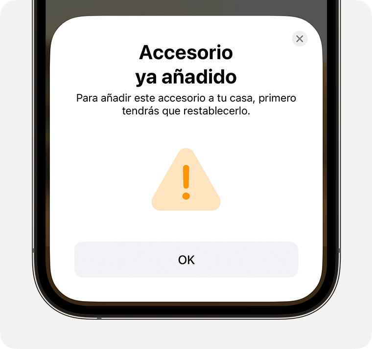 El mensaje “Accesorio ya añadido” que contiene las instrucciones “Para añadir este accesorio a tu casa, primero debes restablecerlo” aparece en el iPhone