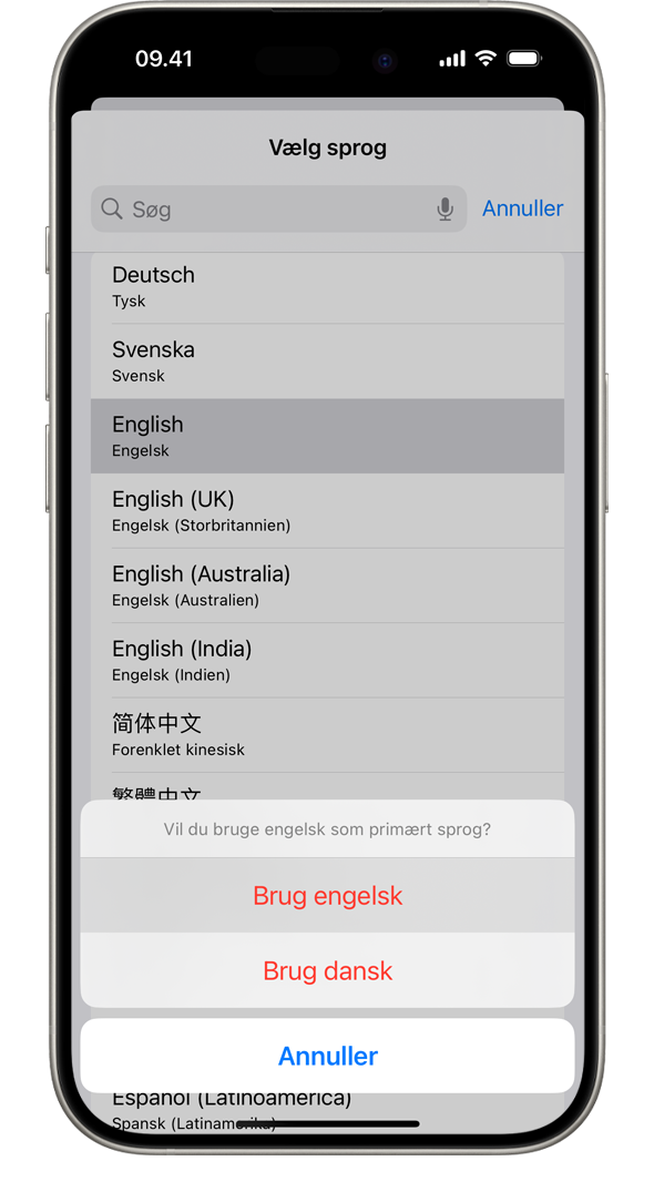 En iPhone, der viser beskeden "Vil du bruge fransk som dit primære sprog?" De viste muligheder er Brug fransk, Brug dansk og Annuller.