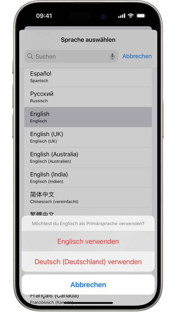 Ein iPhone, auf dem die Warnmeldung „Möchtest du Französisch als primäre Sprache verwenden?“ angezeigt wird. Die angezeigten Optionen sind "Französisch verwenden", "Englisch (USA) verwenden" und "Abbrechen".