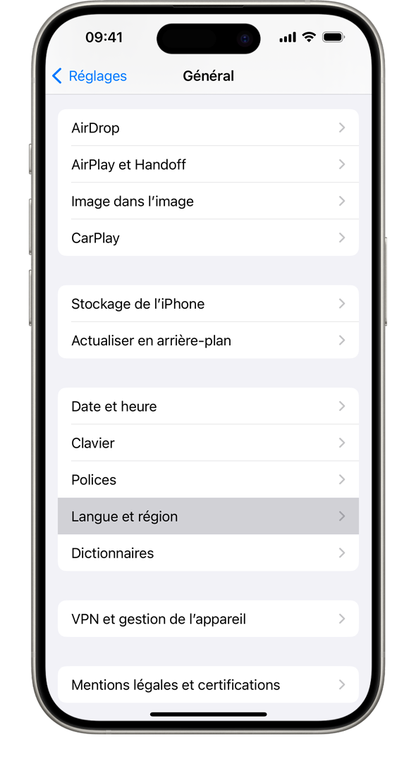 Un iPhone affichant le menu de réglages Général, avec l’option Langue et région en surbrillance.