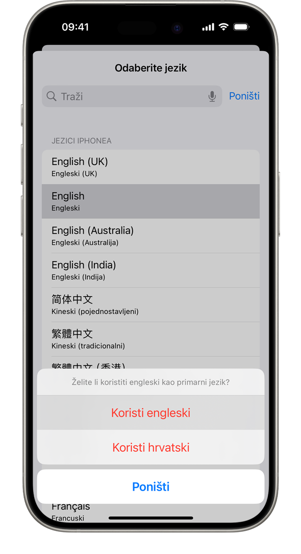 iPhone na kojem se prikazuje upozorenje s porukom „Želite li koristiti francuski kao primarni jezik?” Prikazane su opcije Koristi francuski, Koristi engleski (SAD) i Poništi.
