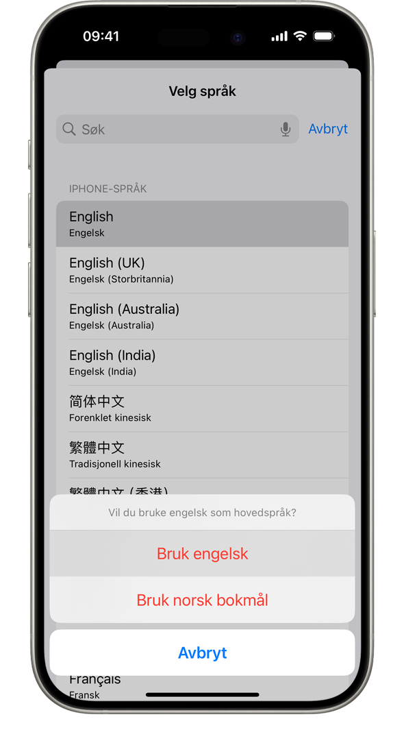 En iPhone som viser et varsel som lyder: «Vil du bruke fransk som hovedspråk?» Alternativene som vises, er Bruk fransk, Bruk engelsk (USA) og Avbryt.