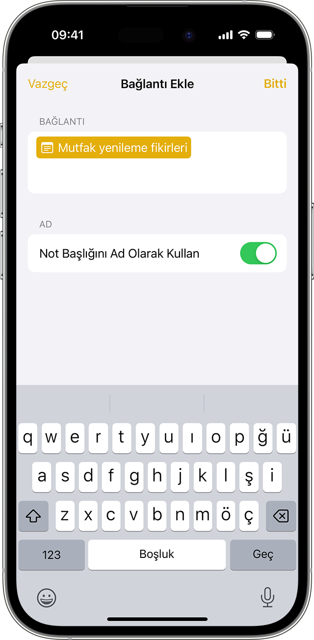 iOS 17 veya sonraki bir sürümü yüklü iPhone'unuzdaki Notlar'da bağlantı ekleme seçenekleri.