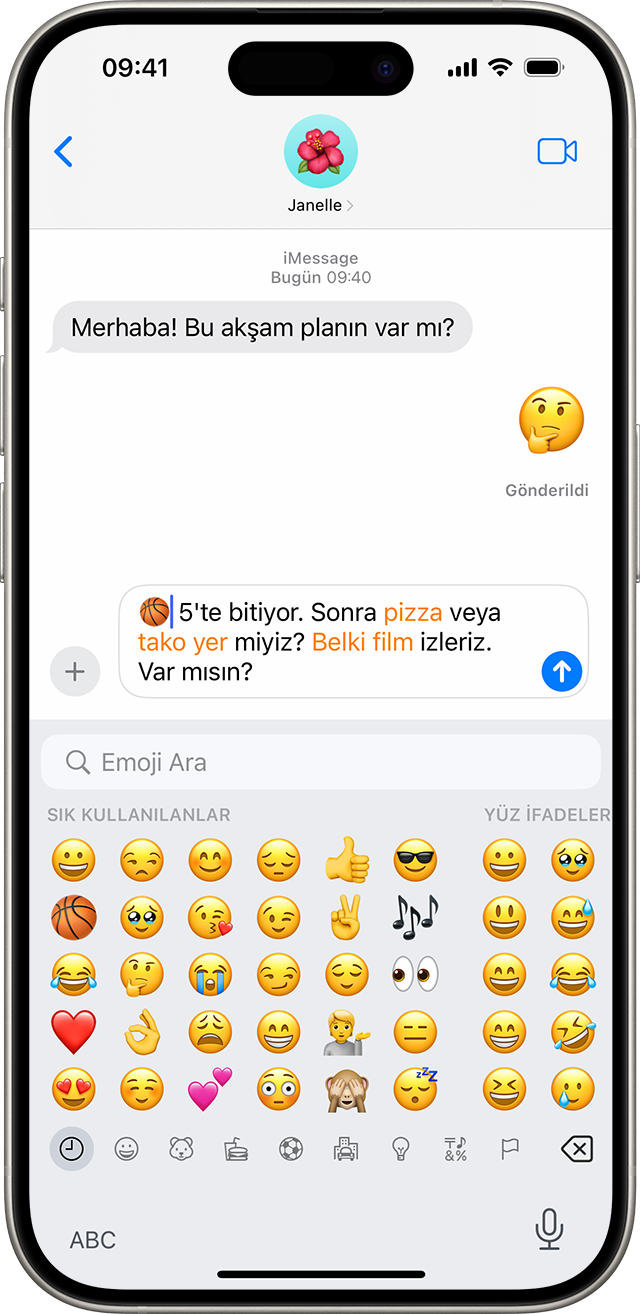 Emoji klavyesinin açık olduğu bir Mesajlar yazışmasını gösteren iPhone ekranı.