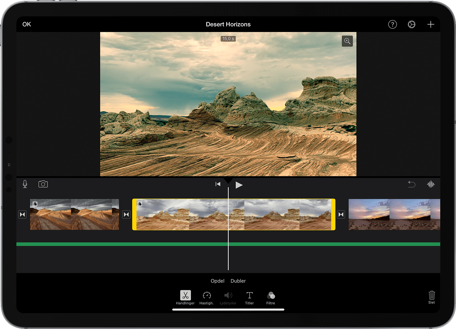 iPad med et åbent iMovie-projekt, hvor der er valgt et videoklip på tidslinjen