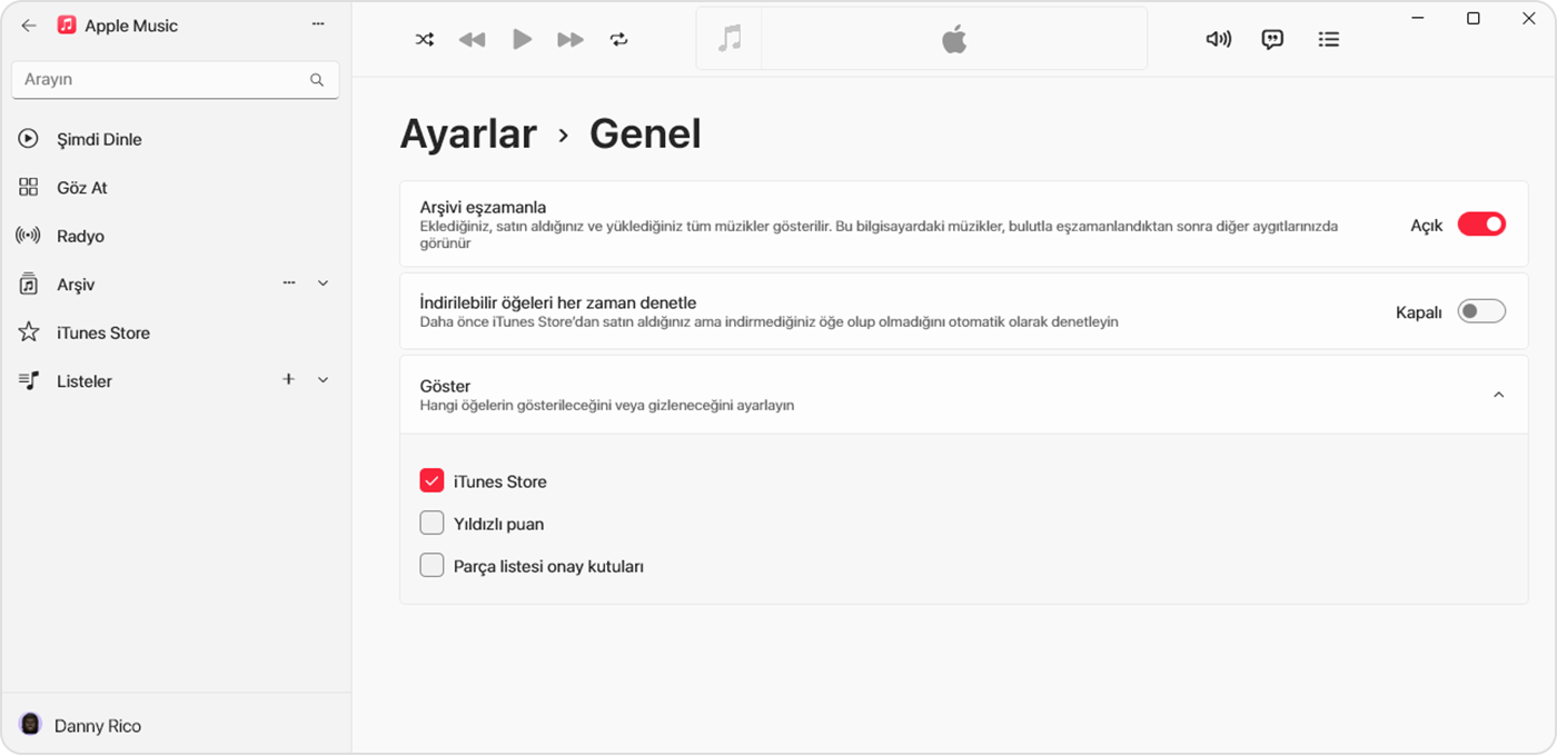 Ayarlar > Genel bölümünde "Arşiv'i Eşzamanla"nın açık olduğunu gösteren Windows için Apple Music uygulaması 