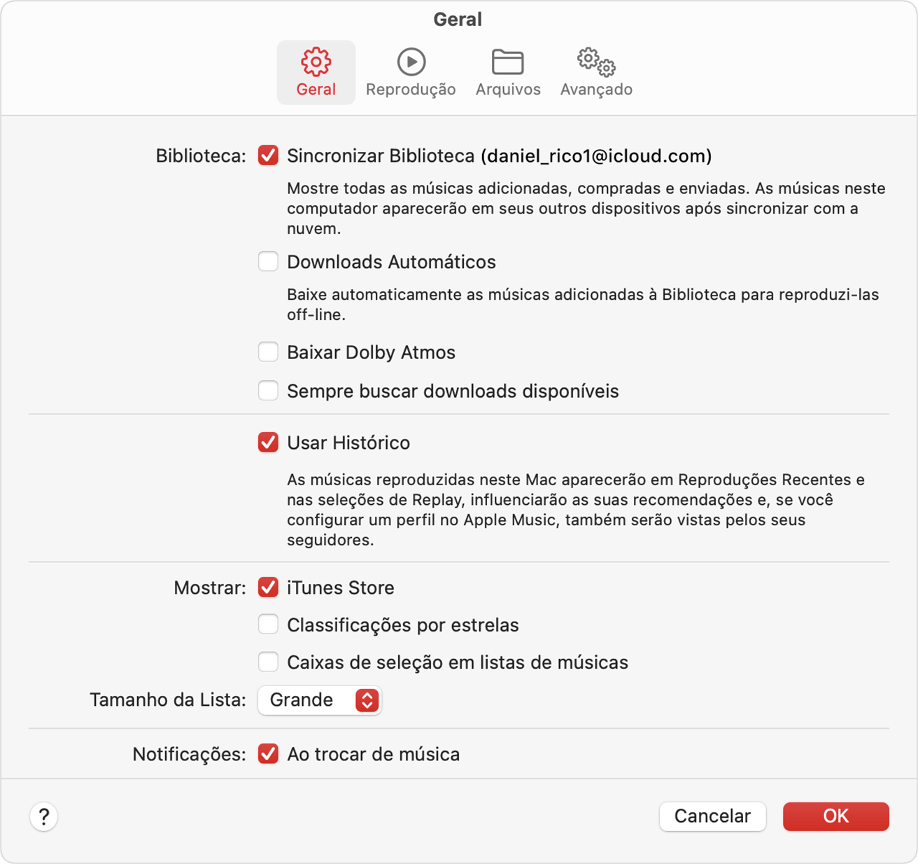 Janela de ajustes do app Apple Music mostrando a iTunes Store selecionada