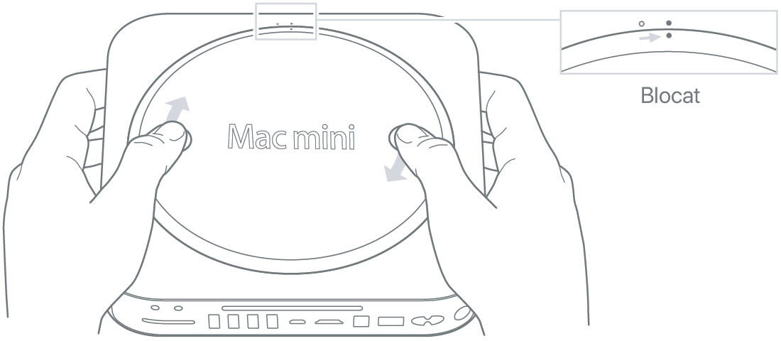 Partea inferioară a computerului Mac mini, ilustrând capacul inferior în poziția de blocare