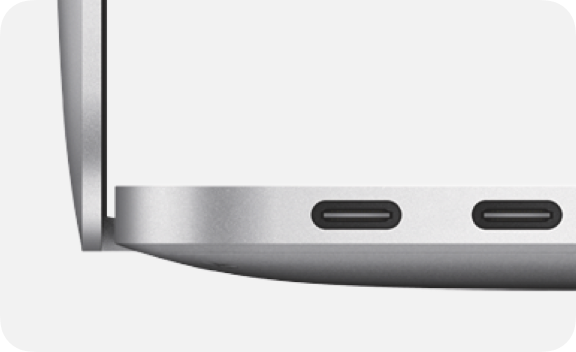 Up close view of two USB-C ports on a MacBook Air