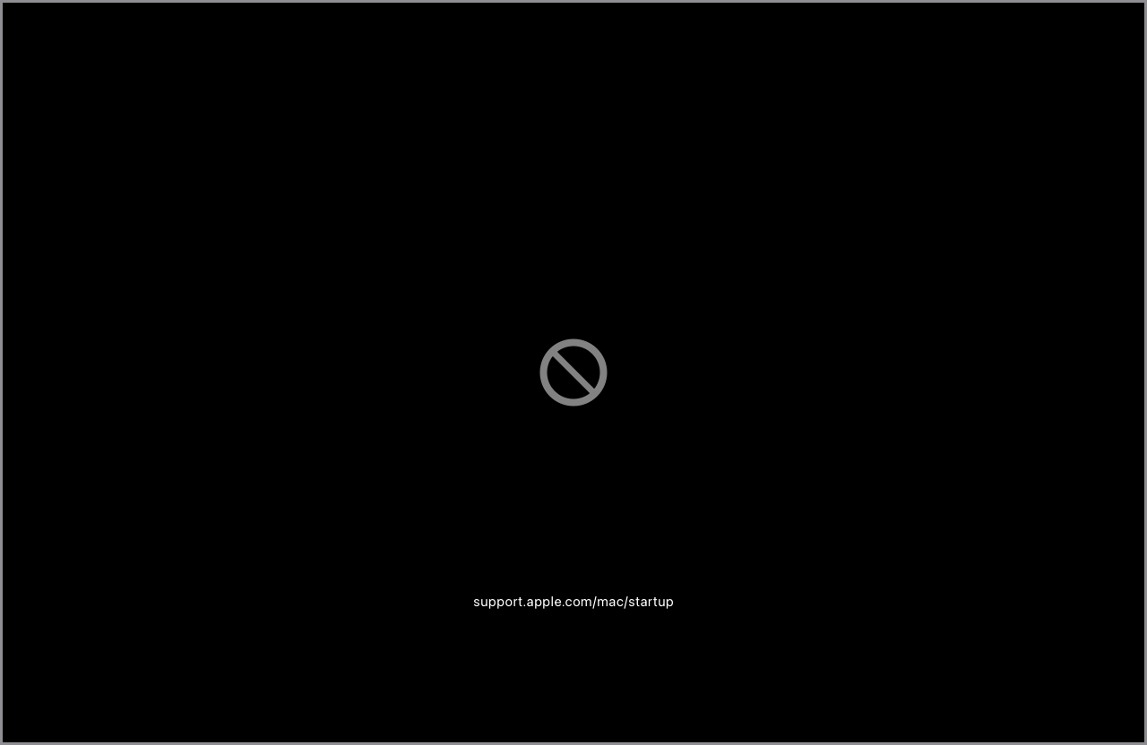 Écran de démarrage macOS affichant un symbole d’interdiction et l’URL support.apple.com/mac/startup