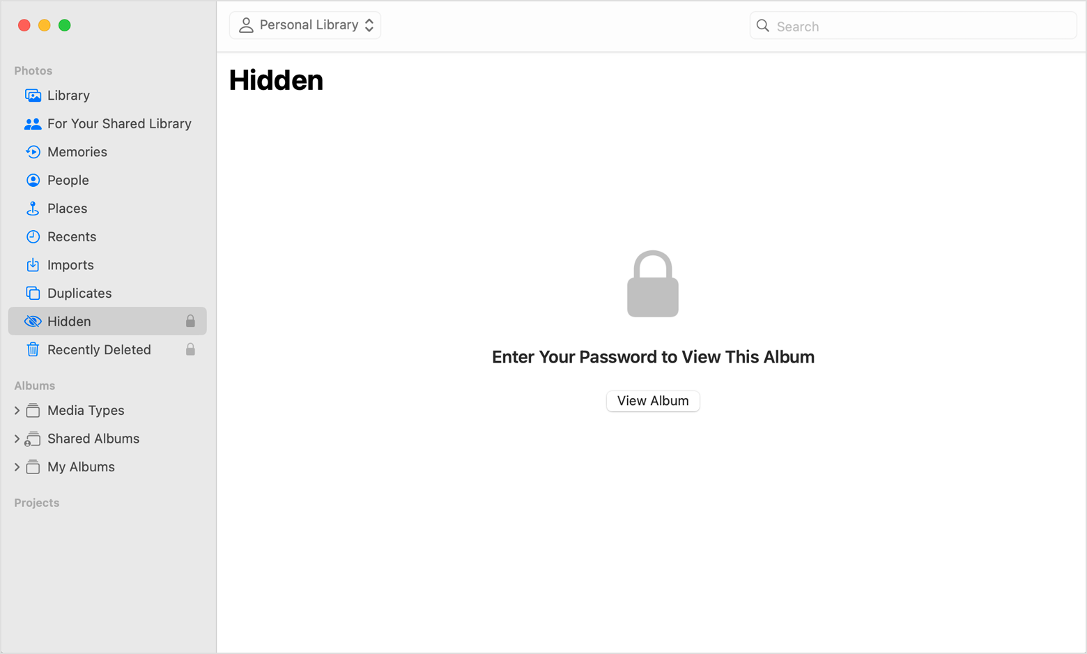 Выделенный альбом «Скрытые» в приложении «Фото» в macOS.