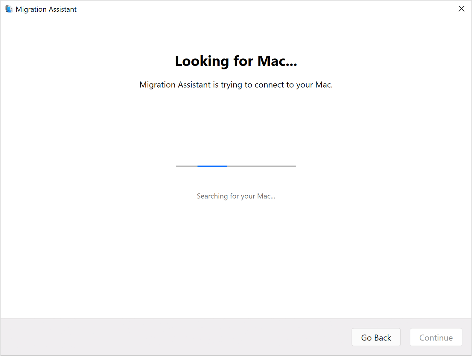 Windows パソコンの移行アシスタント：「Mac を検索中」画面